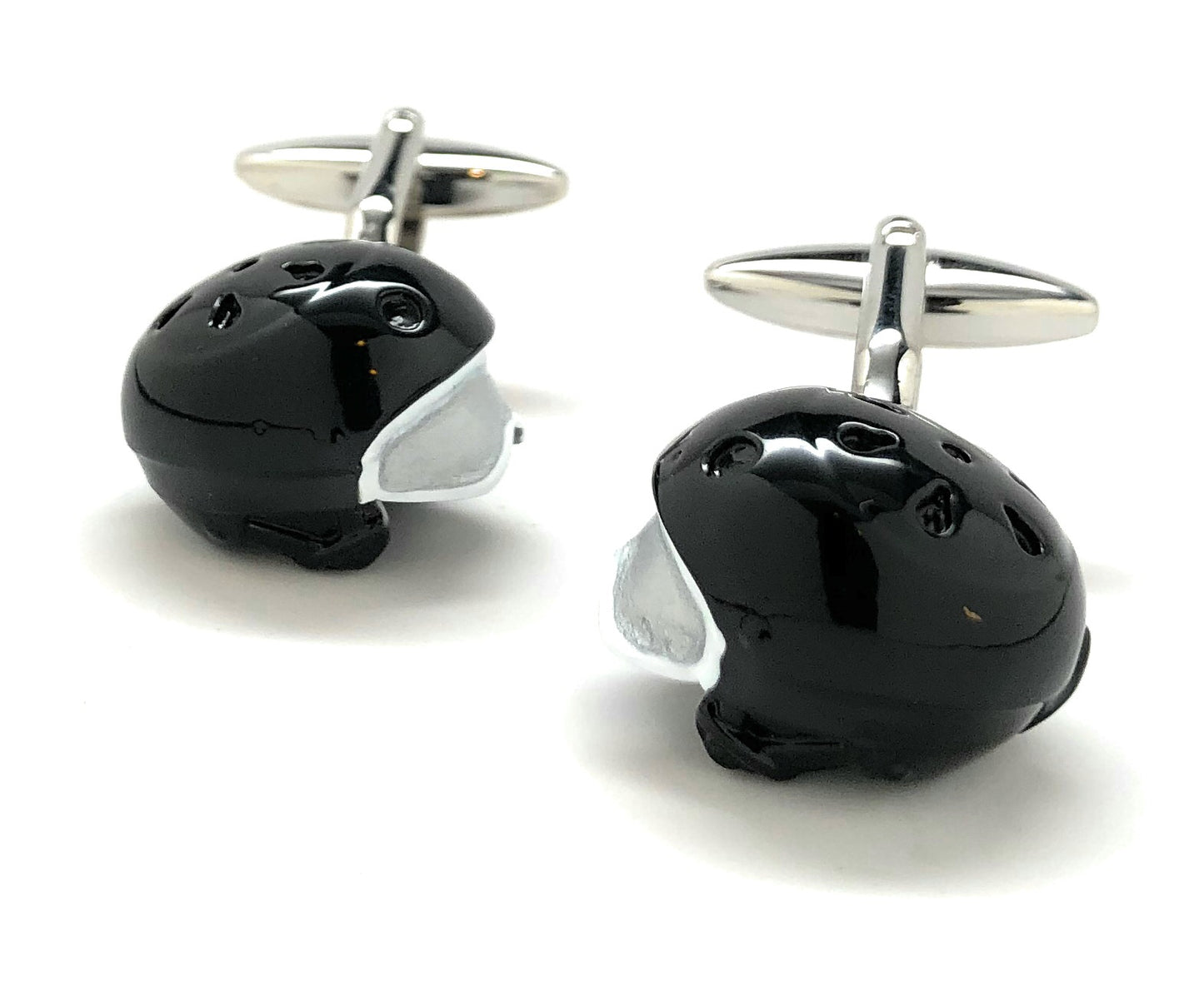 Black elephant-shaped cufflinks on a white background