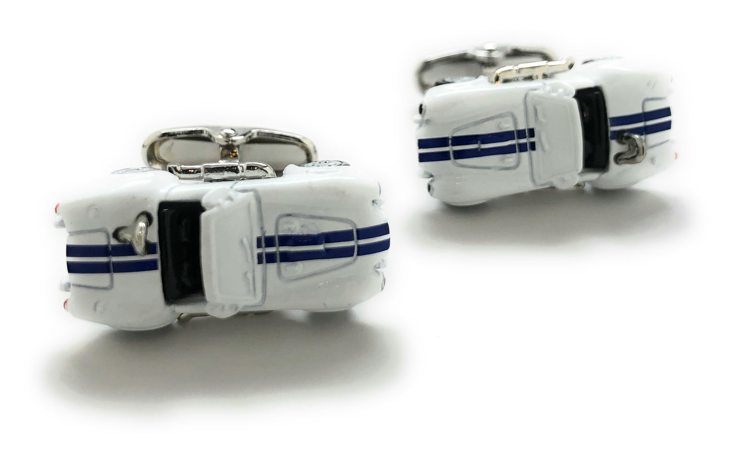 White car-shaped cufflinks with blue stripes on a white background