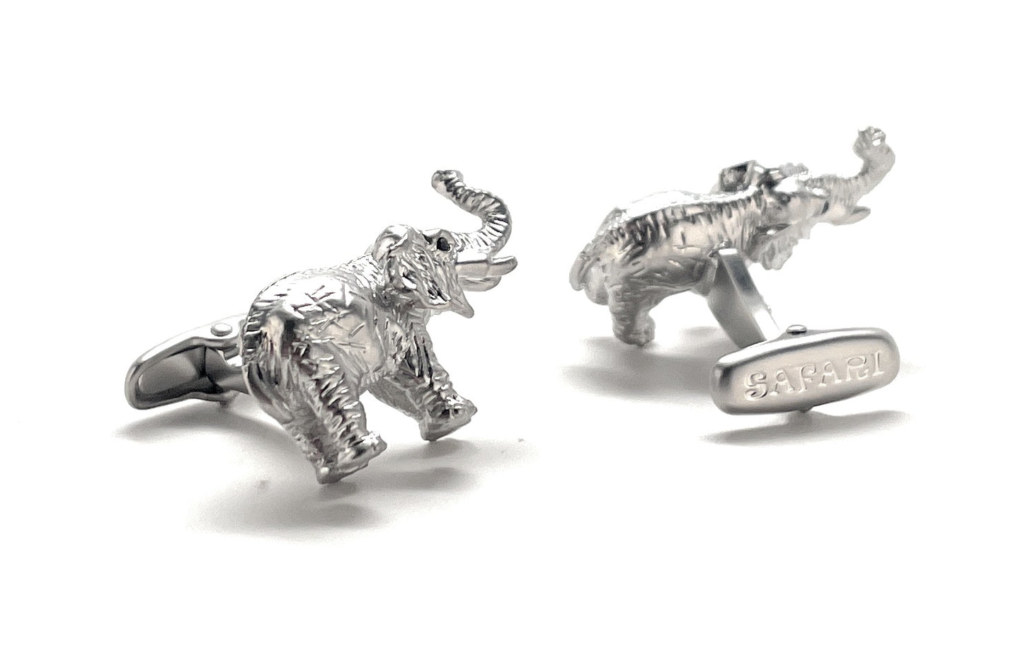 Silver elephant cufflinks on a white background