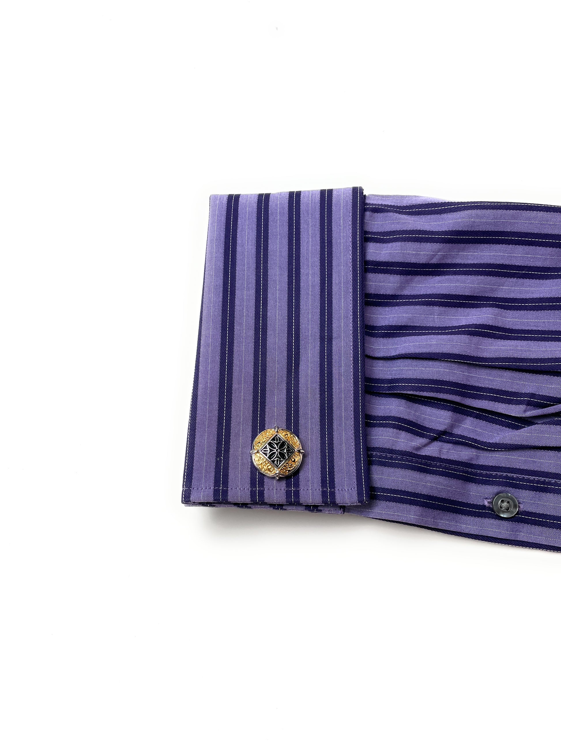 Purple striped shirt with cufflinks on a white background