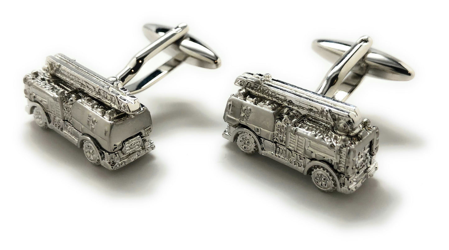 Silver fire truck cufflinks on a white background