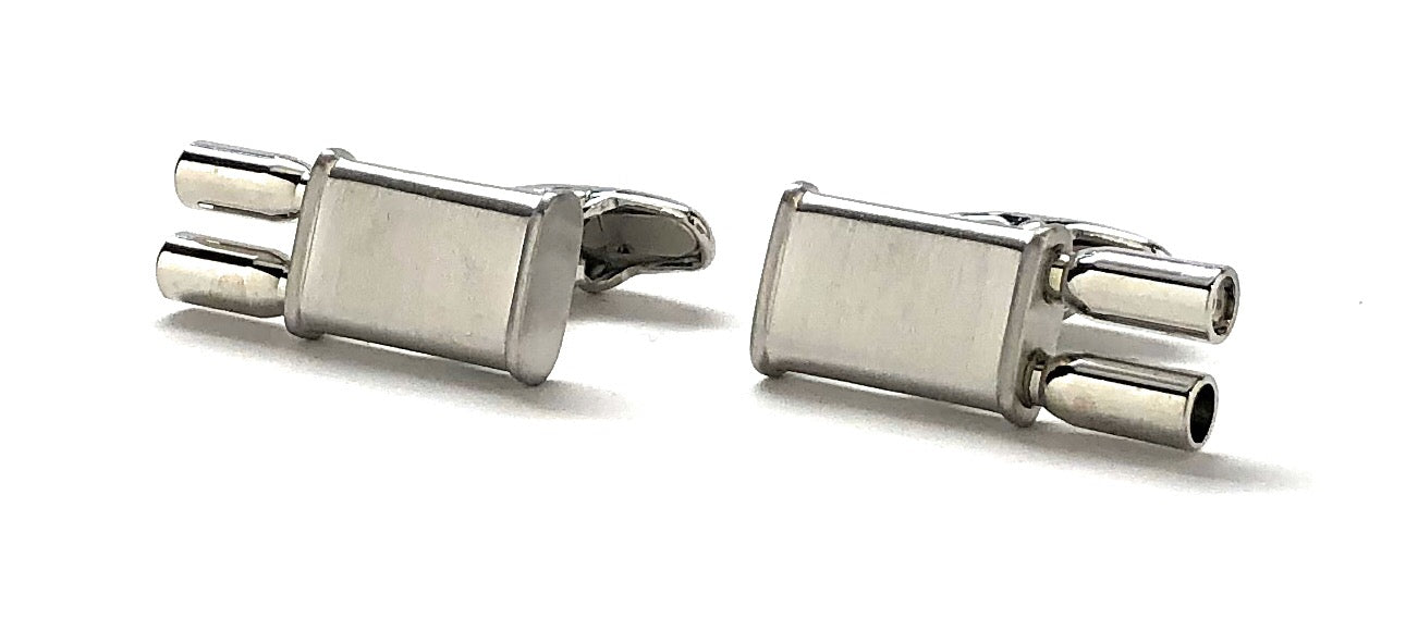 Pair of silver cufflinks on a white background