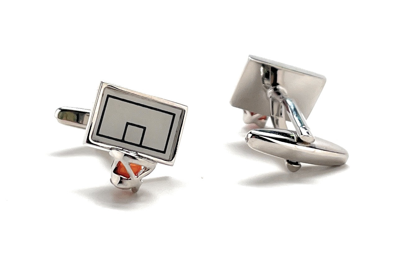 Basketball hoop and basketball cufflinks on a white background