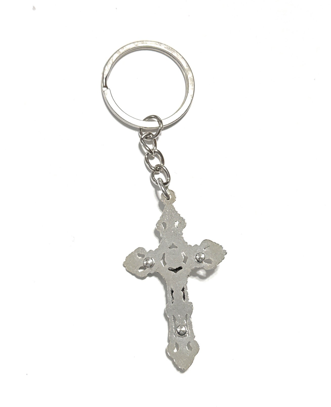 Silver cross keychain on a white background