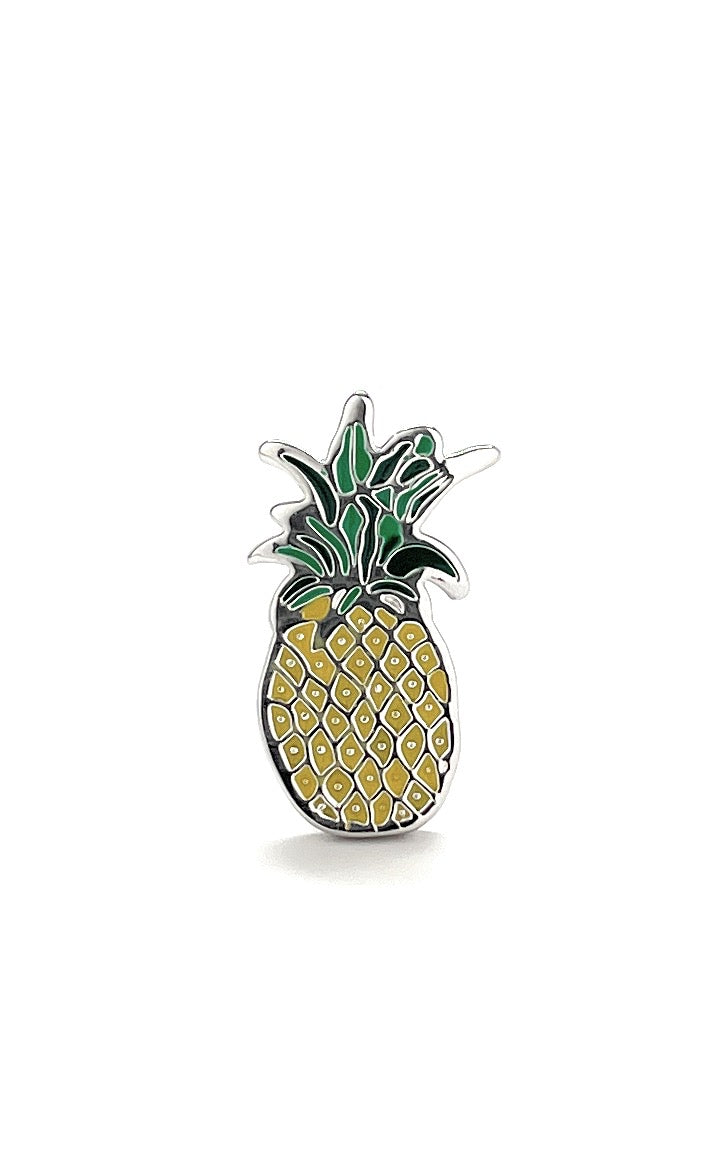 Pineapple-shaped pin on a white background