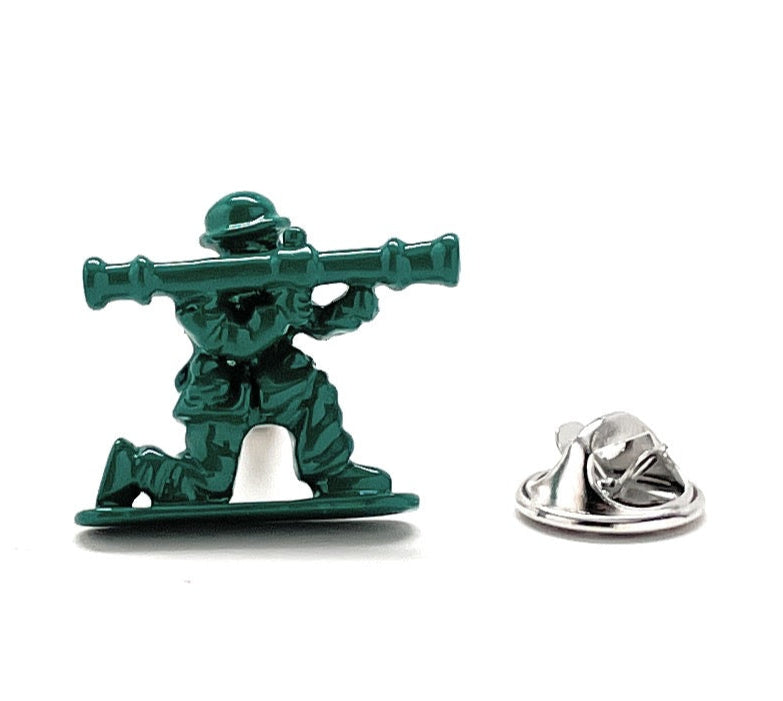 Metallic green soldier figurine with a weapon on a white background
