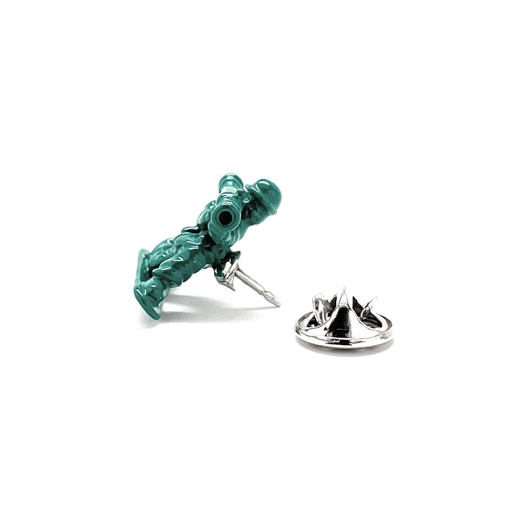 Metallic green soldier figurine with a weapon on a white background