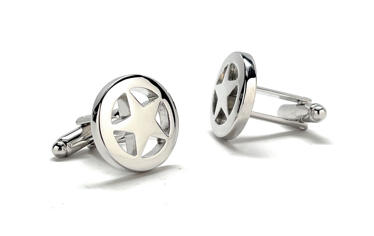 Silver star-shaped cufflinks on a white background