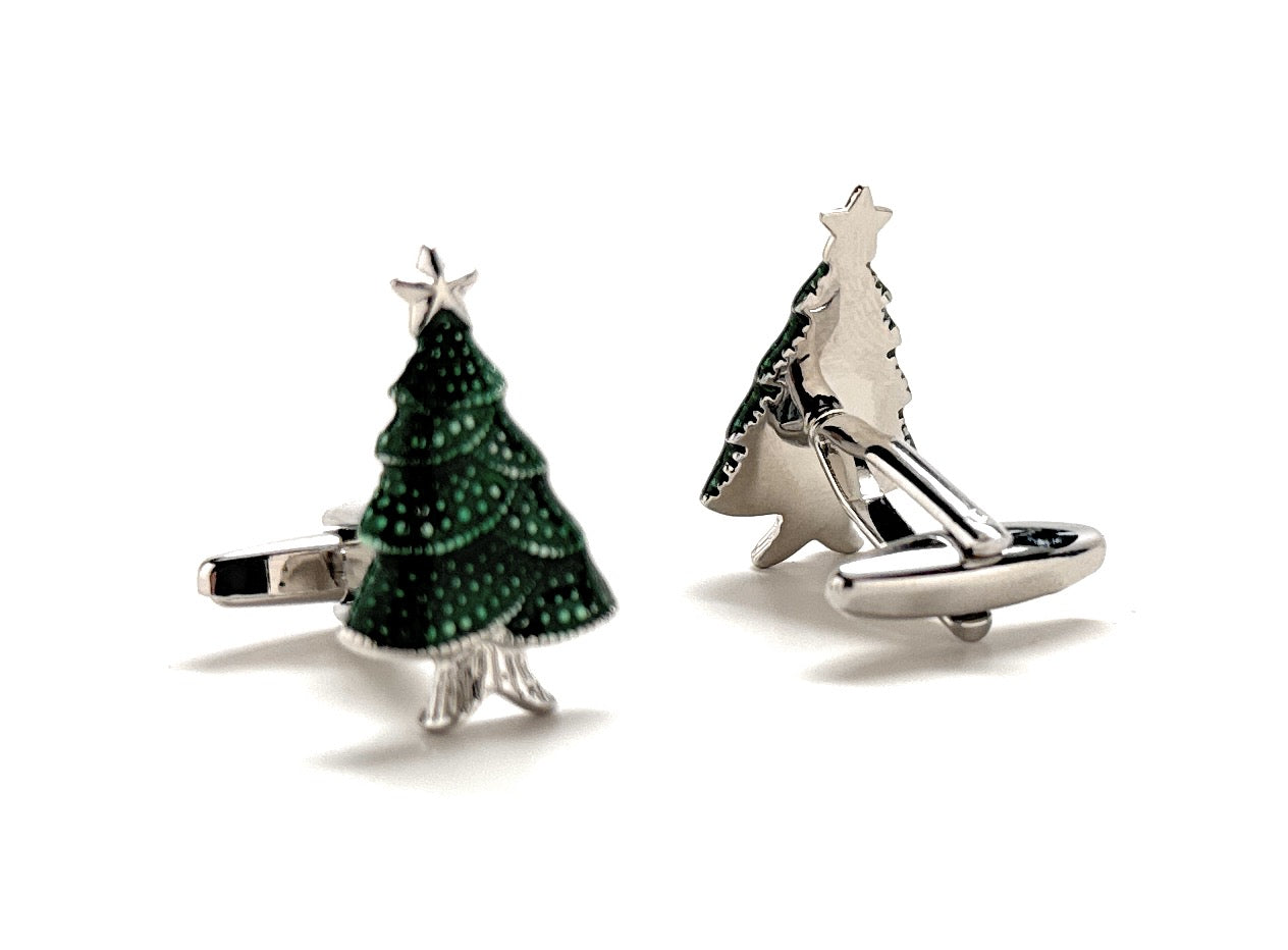 Two tree-shaped cufflinks, one green and one silver, on a white background.