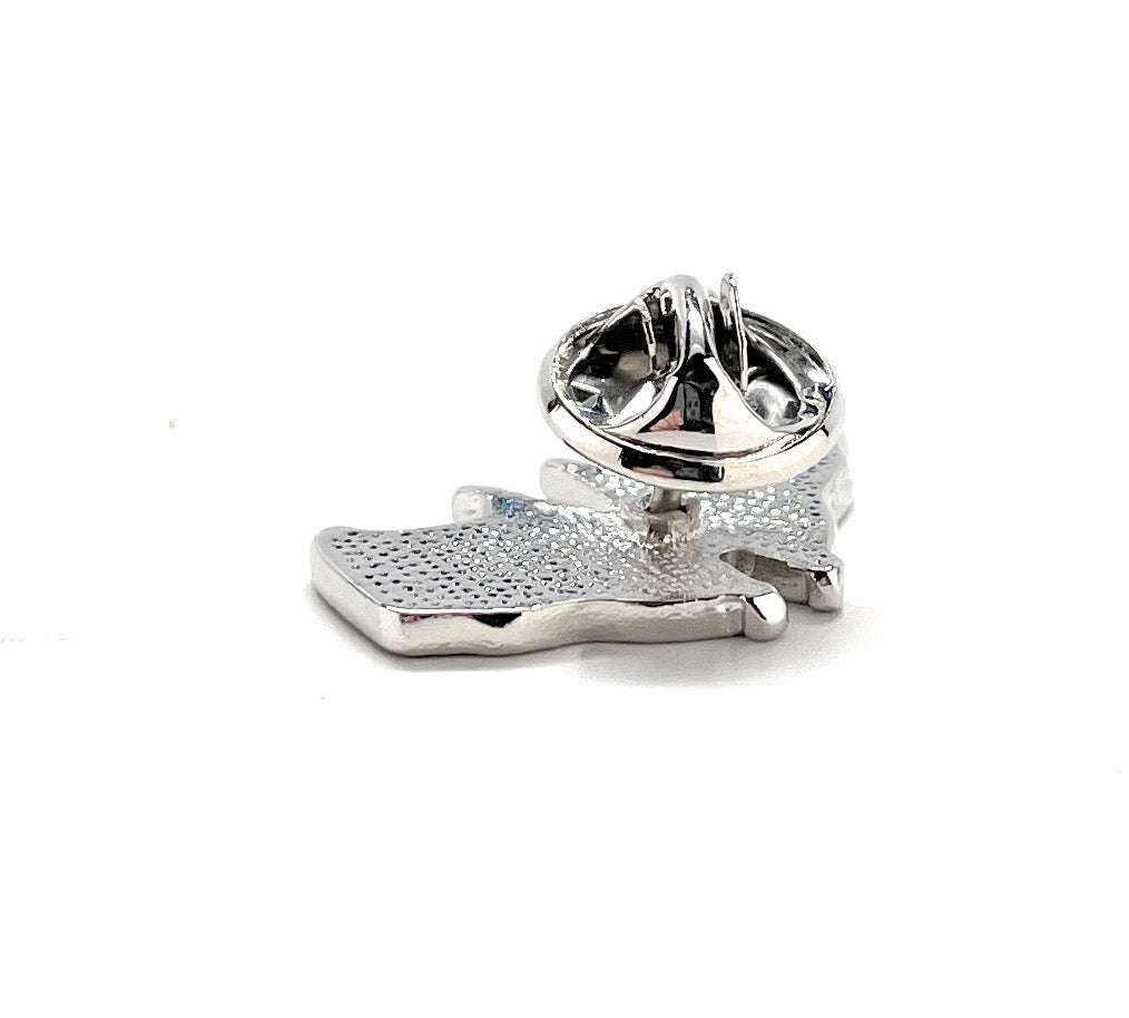 Silver claw-shaped object on a white background