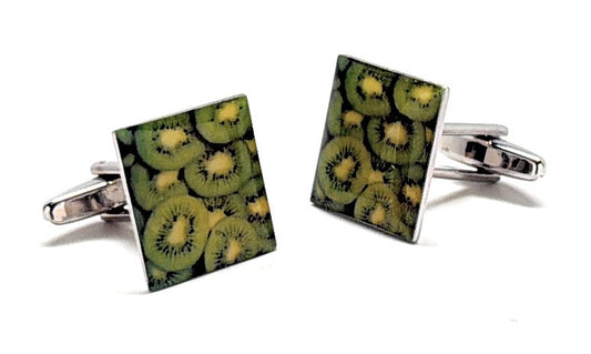 Square cufflinks with kiwi pattern on a white background