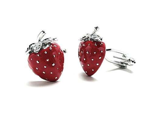 Red strawberry-shaped cufflinks with silver accents on a white background