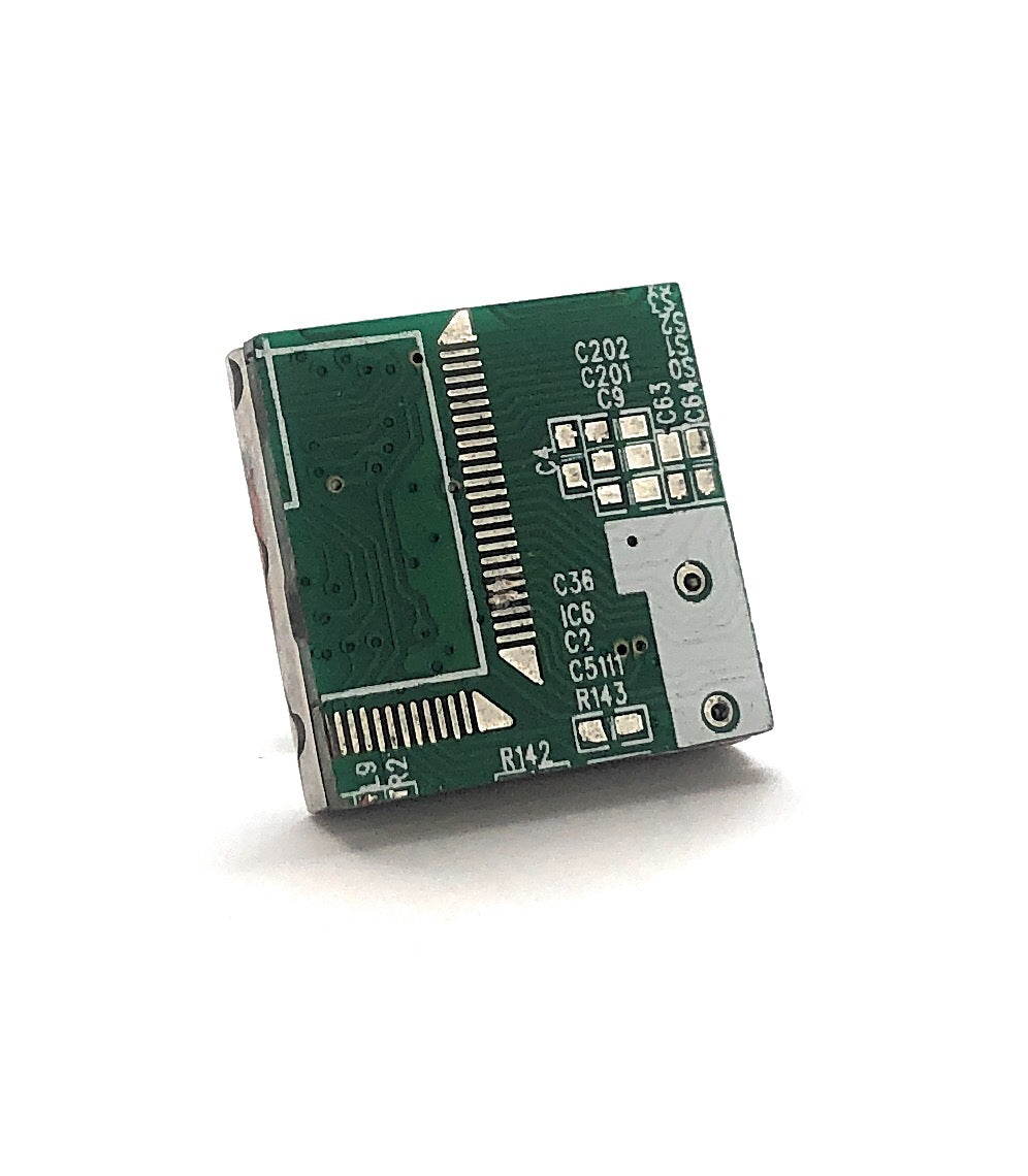 Small green circuit board on a white background