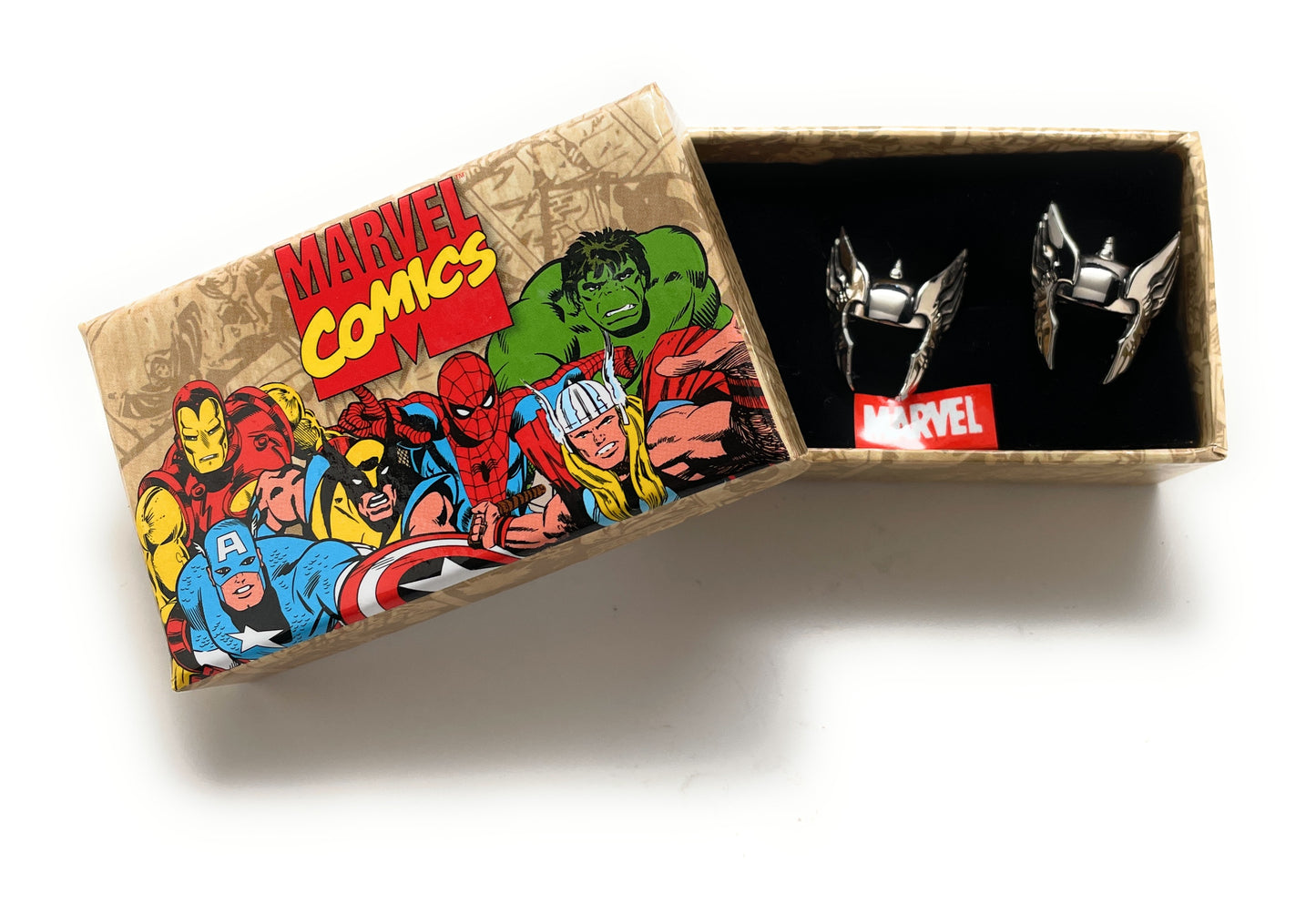 Marvel Comics-themed jewelry box with superhero illustrations and a pair of earrings inside.