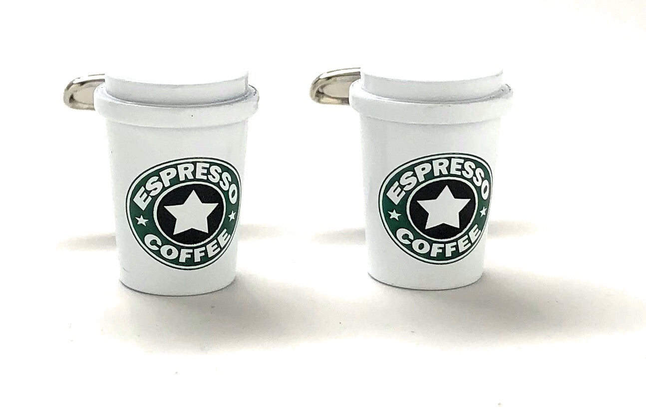 Two white cup-shaped cufflinks with 'Espresso Coffee' text and star design on a white background