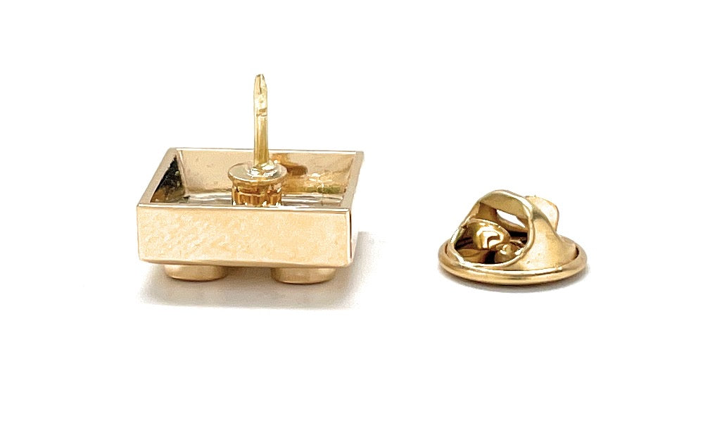 Gold jewelry box with a matching clasp on a white background