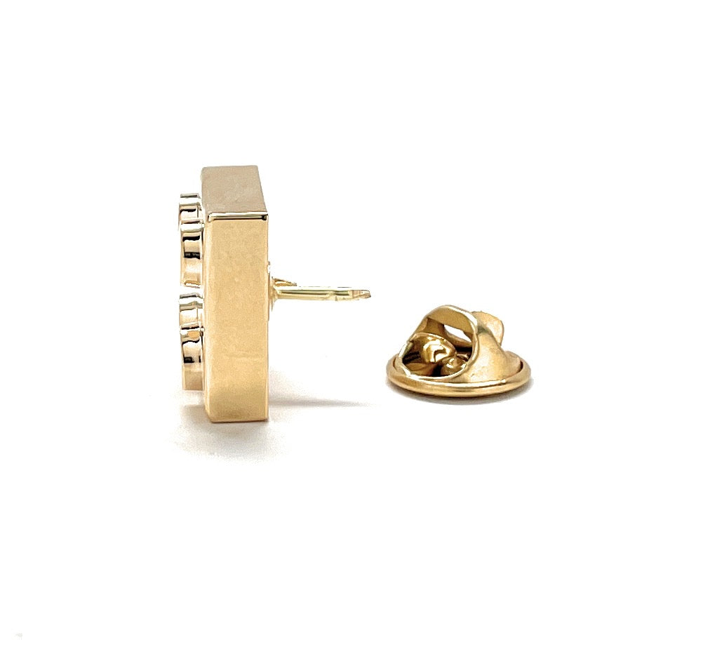 Gold earring on a white background