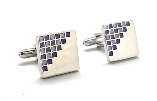 Square cufflinks with pixelated design on a white background