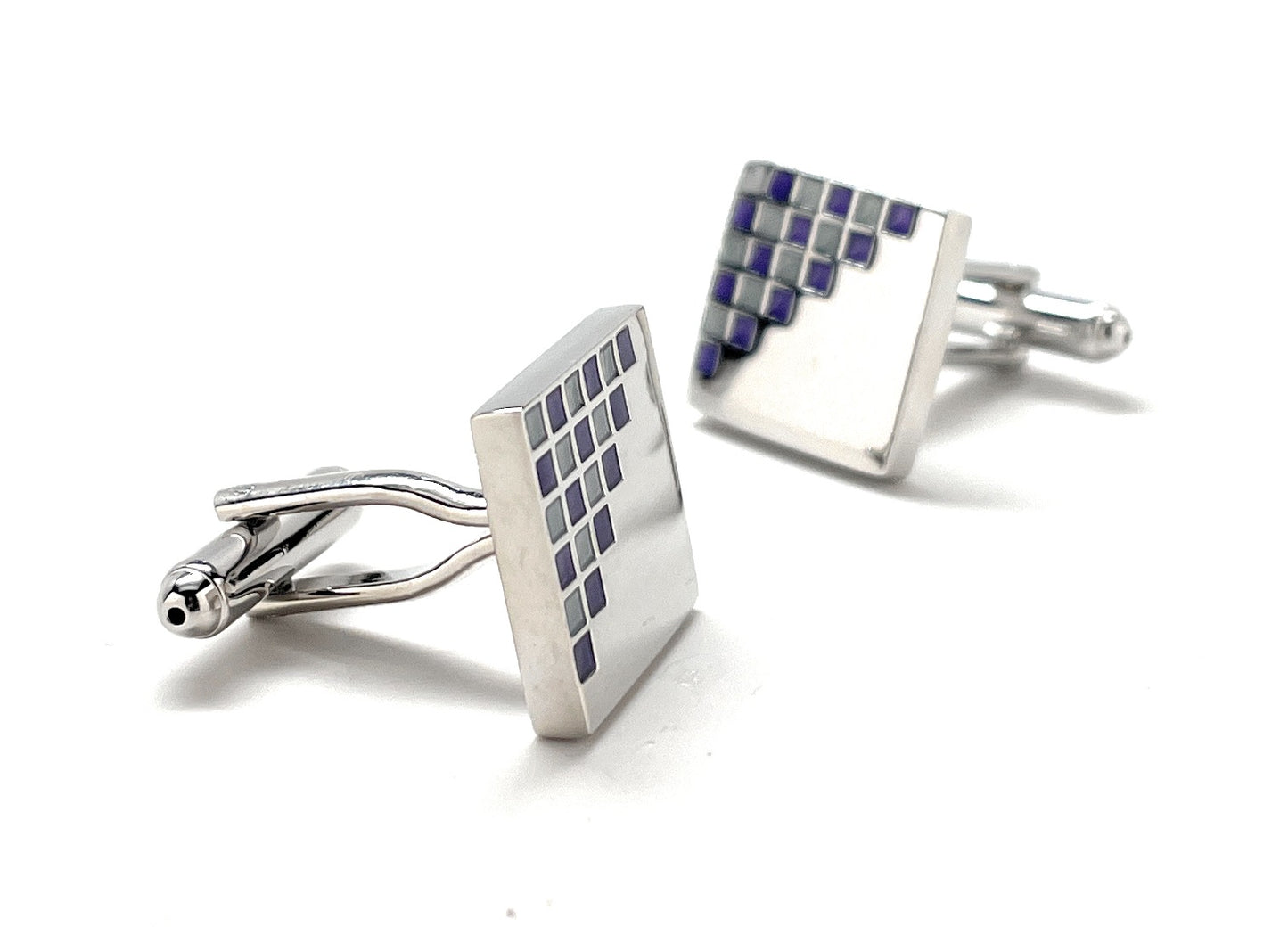 Square cufflinks with checkered pattern on a white background