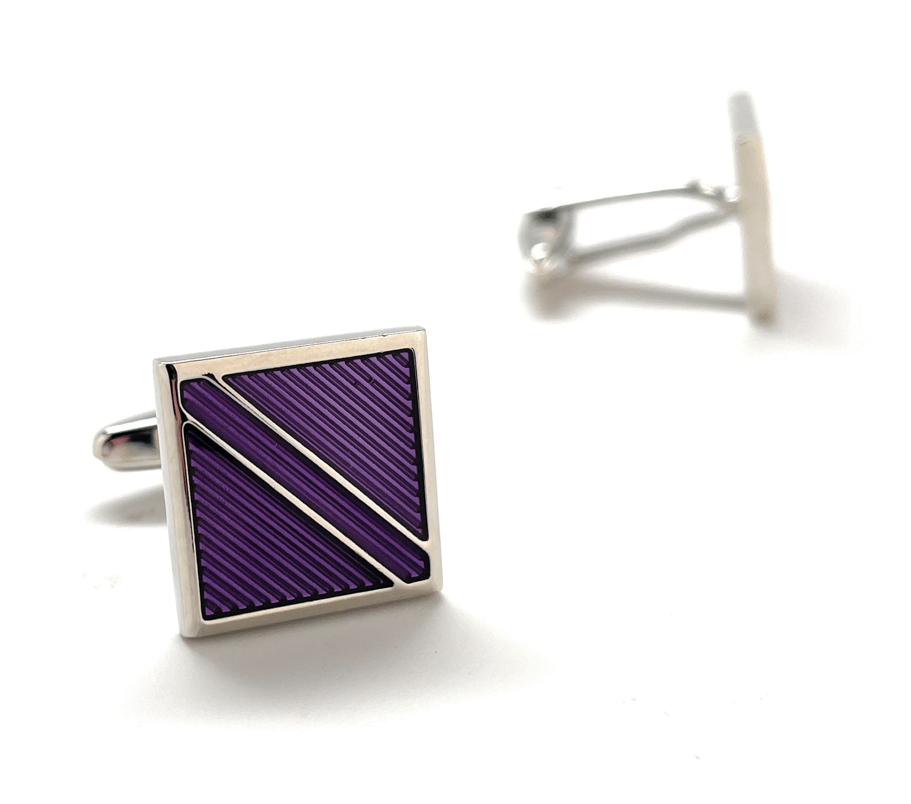 A pair of silver cufflinks with bold diagonal purple stripe patterns, designed by JayPins for a modern, powerful, and sophisticated look — perfect for weddings, business, or fashion-forward outfits.