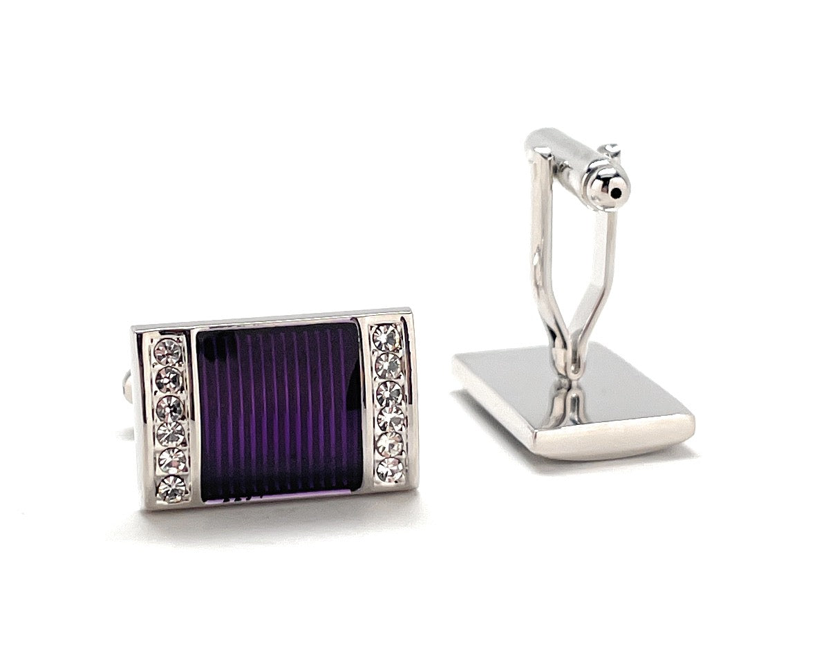 A pair of rectangular silver cufflinks with deep purple striped enamel centers and sparkling crystal borders, designed by JayPins for a bold and luxurious men’s fashion look.
