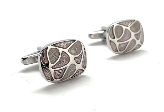 A pair of modern abstract silver cufflinks featuring artistic swirl patterns in soft purple and gray tones, designed by JayPins for a bold and contemporary men’s fashion statement.
