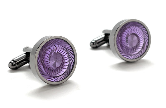 A pair of round silver and gunmetal cufflinks with a deep purple swirl pattern, known as the Purple Haze Cufflinks by JayPins, reflecting a bold and modern men’s fashion design.