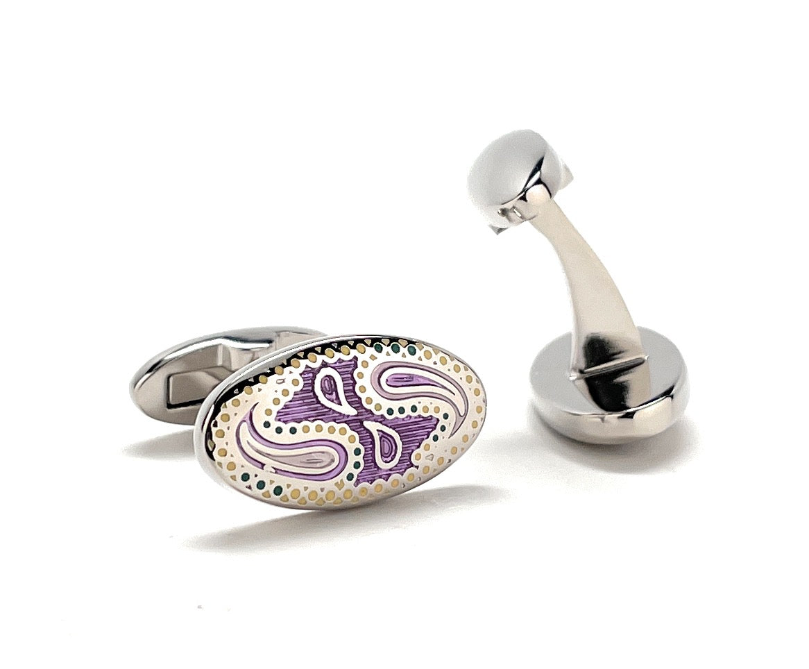A pair of JayPins Purple Paisley cufflinks with elegant enamel detailing in purple, cream, and gold tones set in polished silver oval frames, symbolizing classic men’s sophistication and modern flair.