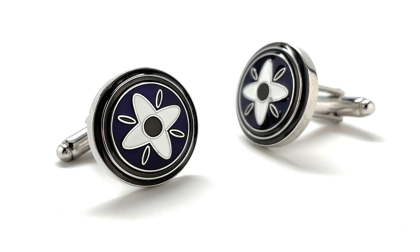 A pair of elegant JayPins Purple Mountain Daisy cufflinks featuring a bold white floral design over deep purple enamel with a polished silver border — perfect for modern, stylish men’s fashion.