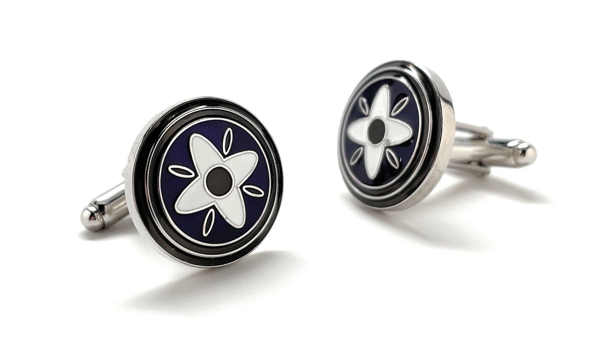 A pair of elegant JayPins Purple Mountain Daisy cufflinks featuring a bold white floral design over deep purple enamel with a polished silver border — perfect for modern, stylish men’s fashion.