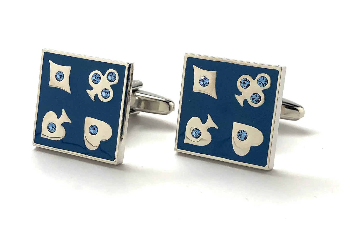 Pair of cufflinks with blue and silver design on a white background