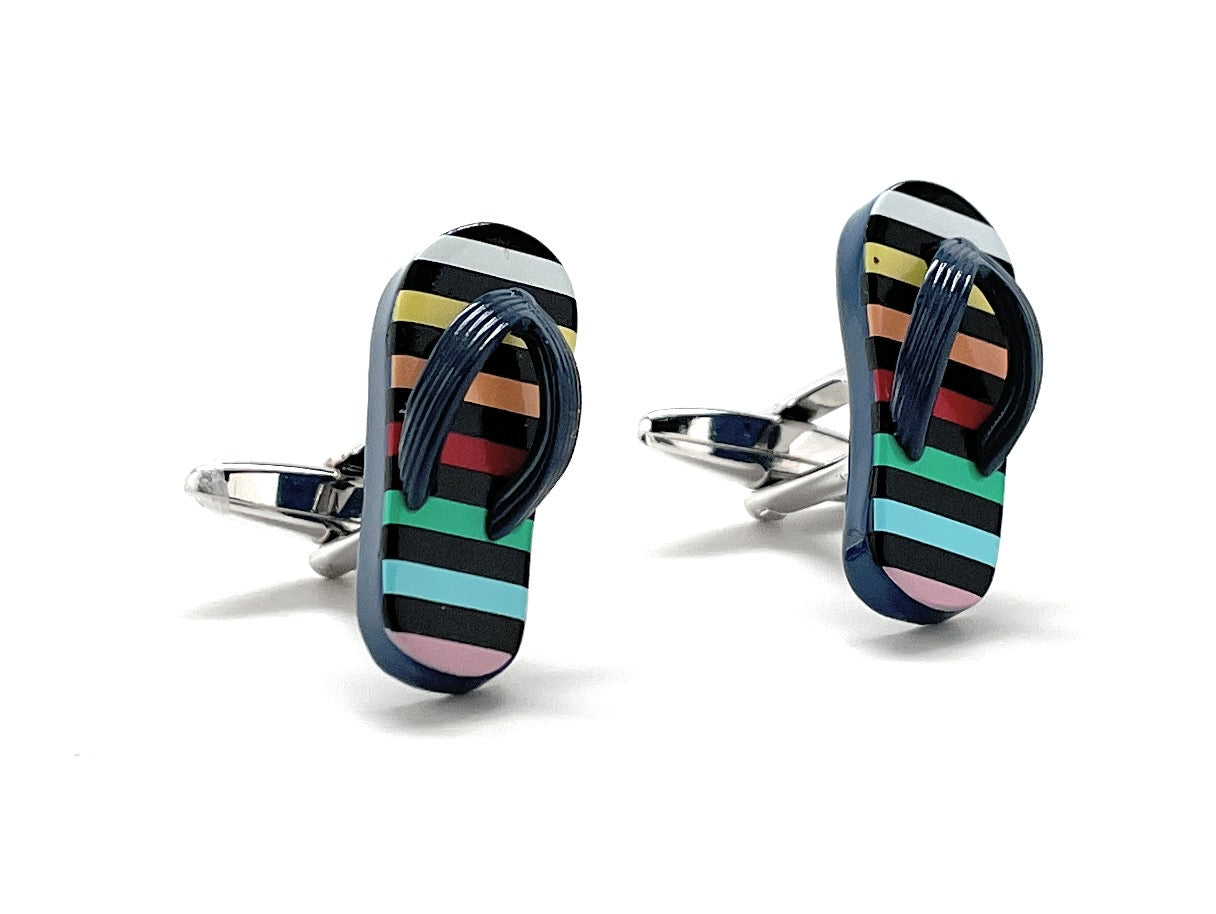 Striped flip-flop cufflinks on a white background