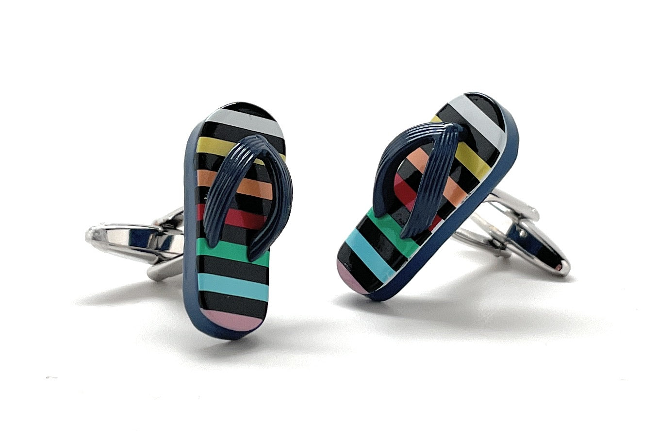 Colorful striped flip-flop cufflinks on a white background