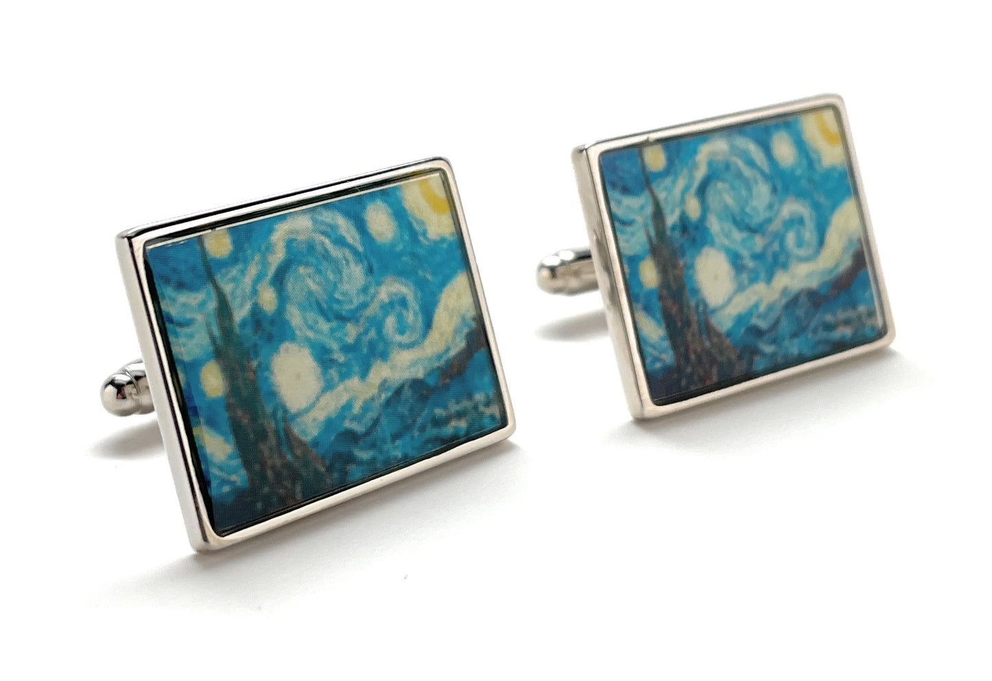 Square cufflinks with a blue and yellow abstract design on a white background