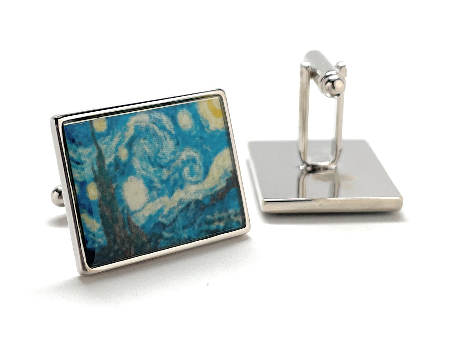 Cufflinks with a blue and white abstract design on a white background