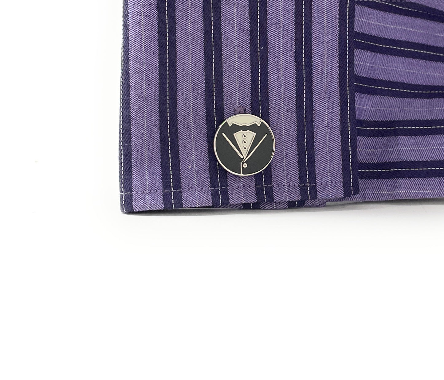 Close-up of a purple striped shirt with a logo on a white background