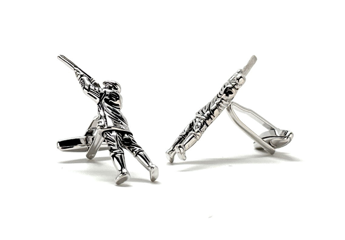 A pair of silver-plated rhodium cufflinks featuring a 3D design of a person archery shooting.