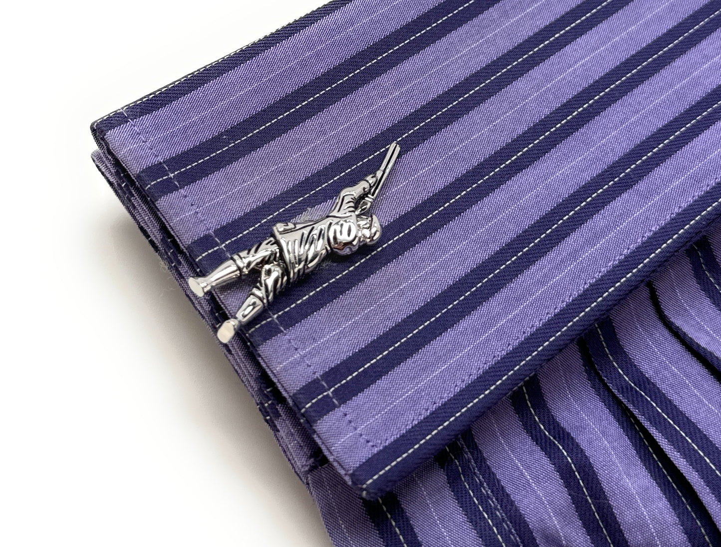 shirt with A pair of silver-plated rhodium cufflinks featuring a 3D design of a person archery shooting.
