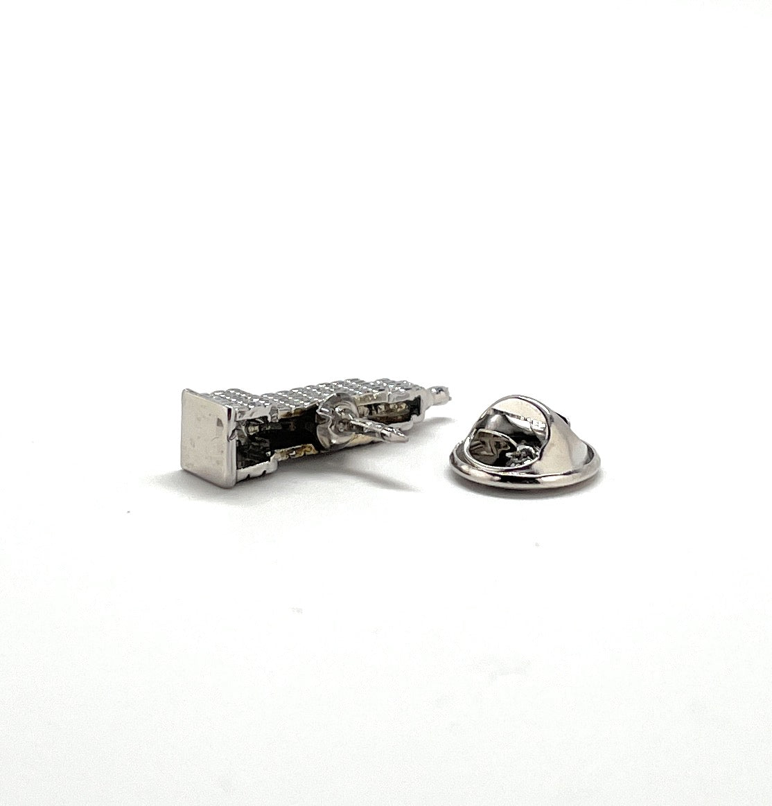 Silver Empire State Building lapel pin with detailed skyscraper design – iconic New York City souvenir and fashion accessory by JayPins