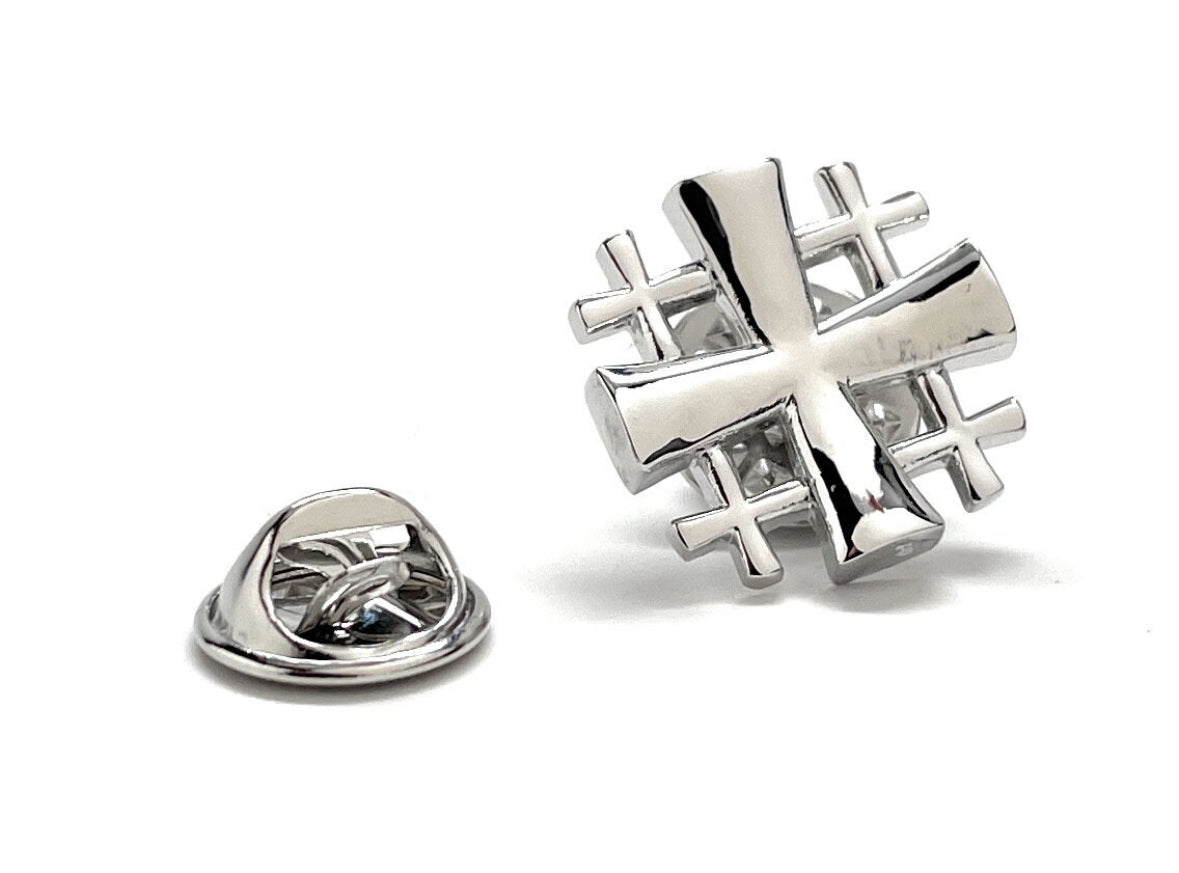 A silver-tone Jerusalem Cross lapel pin with a 3D butterfly back, showing an enamel pin with a reflective silver finish.