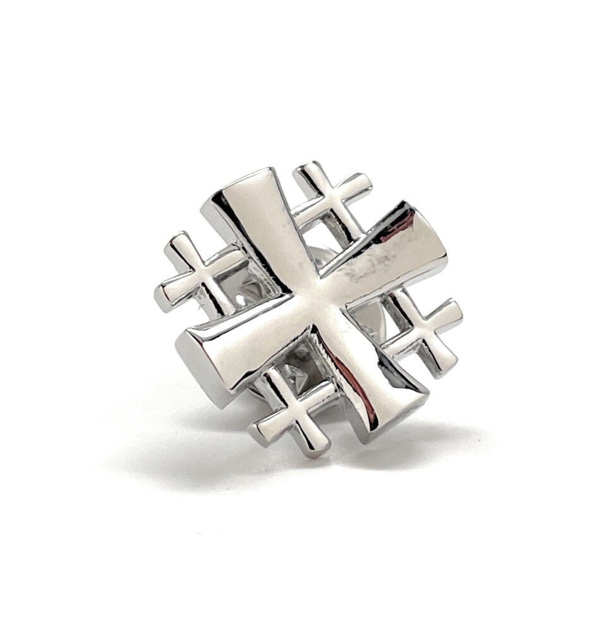 A silver-tone Jerusalem Cross lapel pin with a 3D butterfly back, showing an enamel pin with a reflective silver finish.