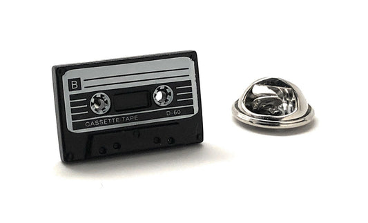 Cassette tape-shaped lapel pin on a white background