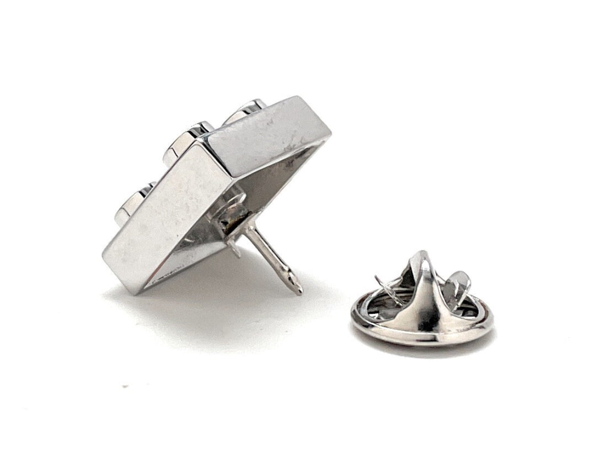 Silver earring backs on a white background