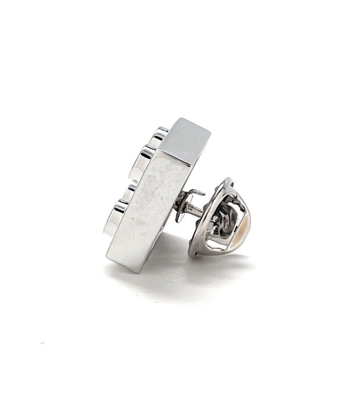Silver earring on a white background