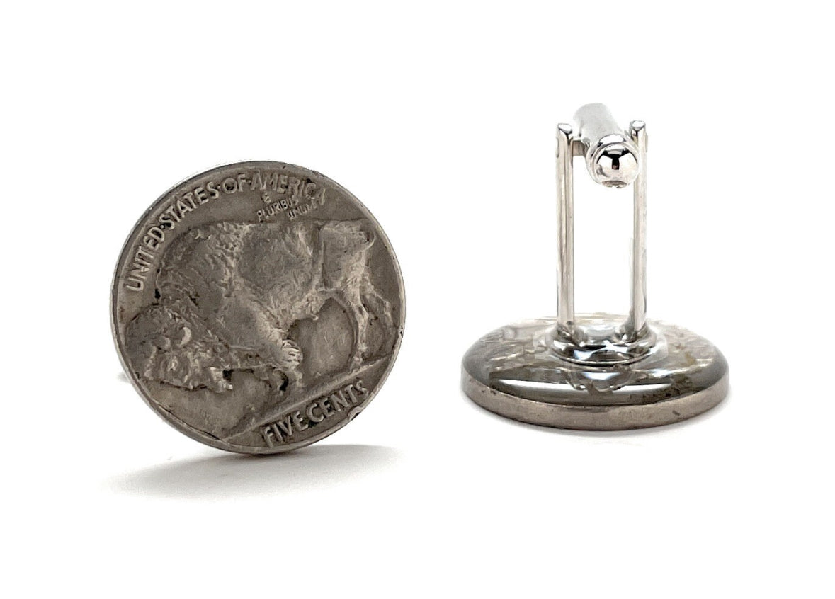 A set of three Buffalo nickels, also known as Indian Head nickels, with an embossed design of a bison on the front. These are silver-colored coins with the text 'United States of America' and 'Five Cents' visible.