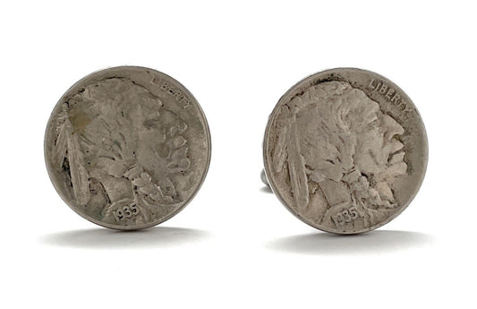 A pair of silver Indian Head nickel cufflinks with a rhodium plating and a bullet backing.