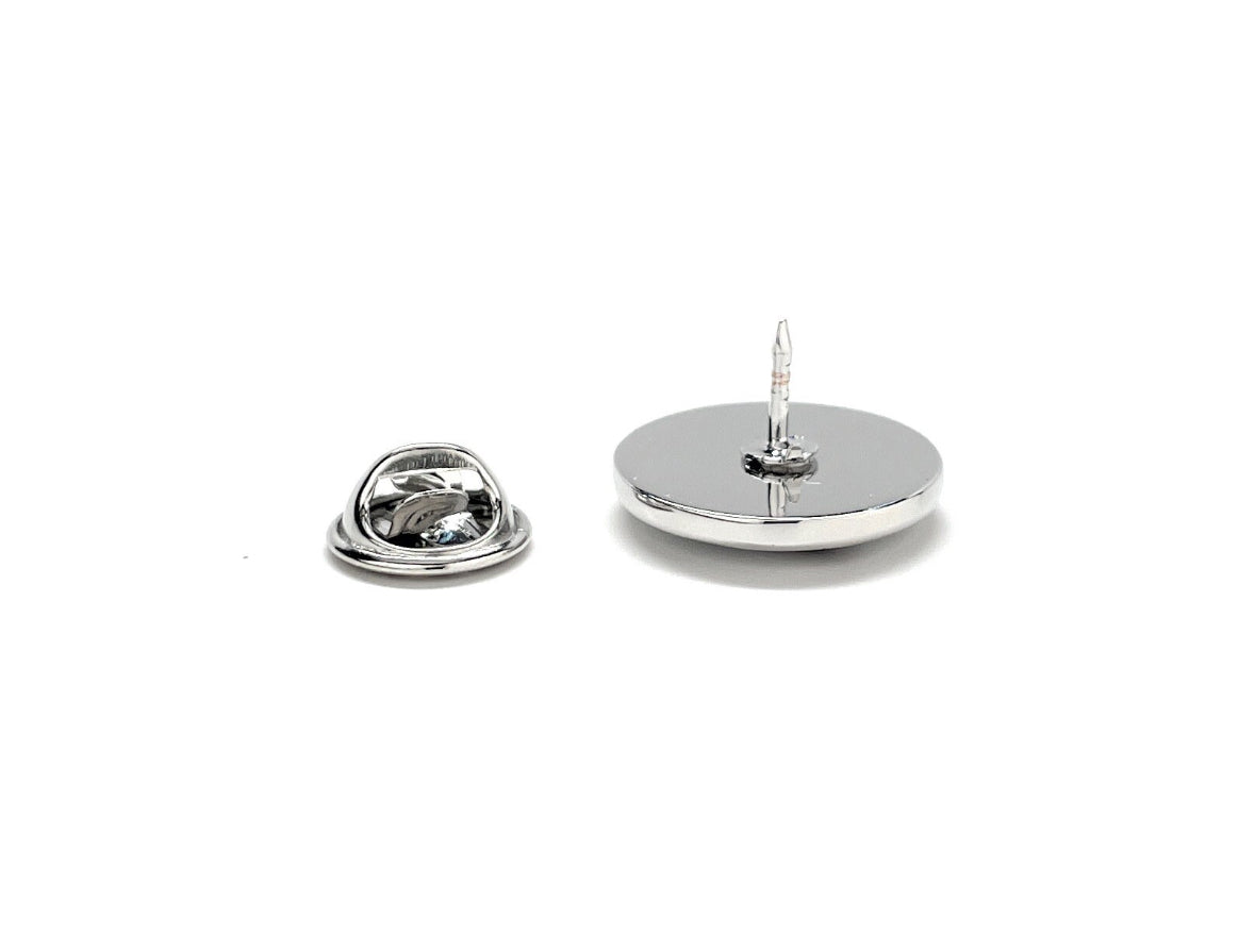 A round enamel pin with a silver rhodium plated backing, featuring a design with stars and stripes, and the text 'KING OF THE DAREDEVILS'.