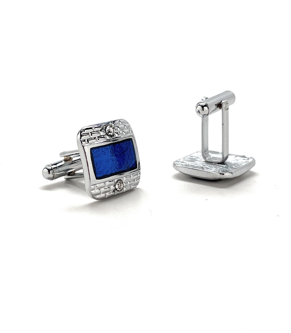 Silver cufflinks with a blue stone on a white background
