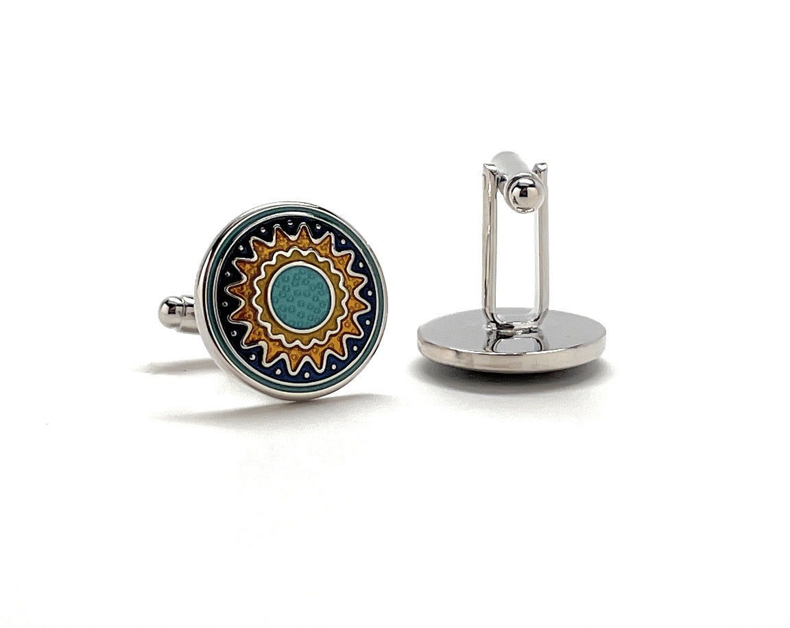 Cufflinks with a sunflower design on a white background