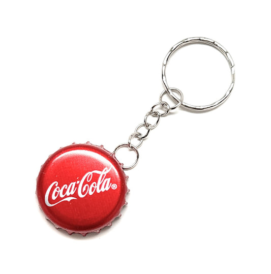 A unique vintage Coca-Cola bottle cap keychain with a classic red and white Coke logo, attached to a durable keyring.